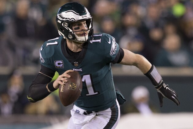 PHILADELPHIA, PA - DECEMBER 03: Carson Wentz #11 of the Philadelphia Eagles runs with the ball against the Washington Redskins at Lincoln Financial Field on December 3, 2018 in Philadelphia, Pennsylvania. (Photo by Mitchell Leff/Getty Images)