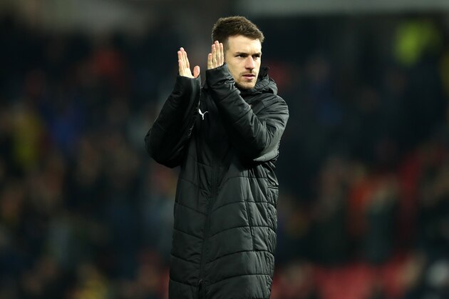 WATFORD, ENGLAND - APRIL 15:  Aaron Ramsey of Arsenal applauds the fans following the Premier League match between Watford FC and Arsenal FC at Vicarage Road on April 15, 2019 in Watford, United Kingdom. (Photo by Marc Atkins/Getty Images)