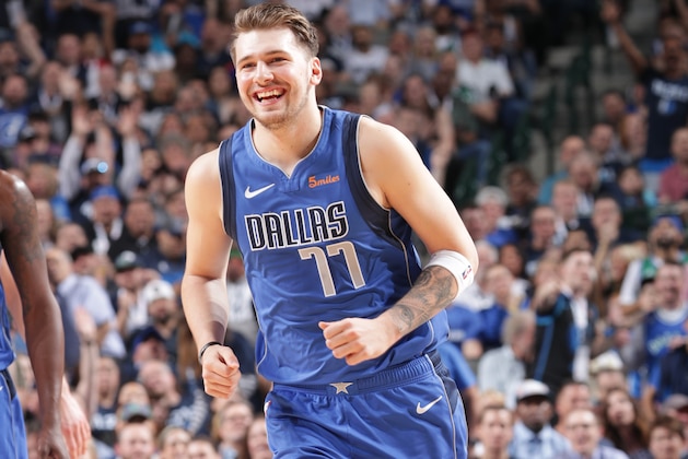 DALLAS, TX - APRIL 9: Luka Doncic #77 of the Dallas Mavericks smiles against the Phoenix Suns on April 9, 2019 at the American Airlines Center in Dallas, Texas. NOTE TO USER: User expressly acknowledges and agrees that, by downloading and or using this photograph, User is consenting to the terms and conditions of the Getty Images License Agreement. Mandatory Copyright Notice: Copyright 2019 NBAE (Photo by Glenn James/NBAE via Getty Images)
