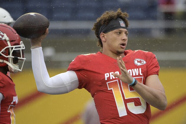 AFC quarterback Patrick Mahomes (15), of the Kansas City Chiefs, warms up before the NFL Pro Bowl football game against the NFC Sunday, Jan. 27, 2019, in Orlando, Fla. (AP Photo/Phelan M. Ebenhack)