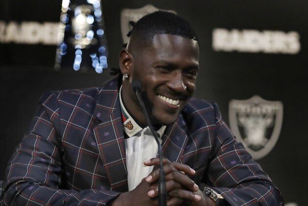 Oakland Raiders wide receiver Antonio Brown smiles during an NFL football news conference, Wednesday, March 13, 2019, in Alameda, Calif. (AP Photo/Ben Margot)
