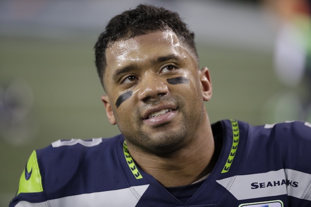 Seattle Seahawks quarterback Russell Wilson stretches before an NFL football game against the Kansas City Chiefs, Sunday, Dec. 23, 2018, in Seattle. (AP Photo/Elaine Thompson)