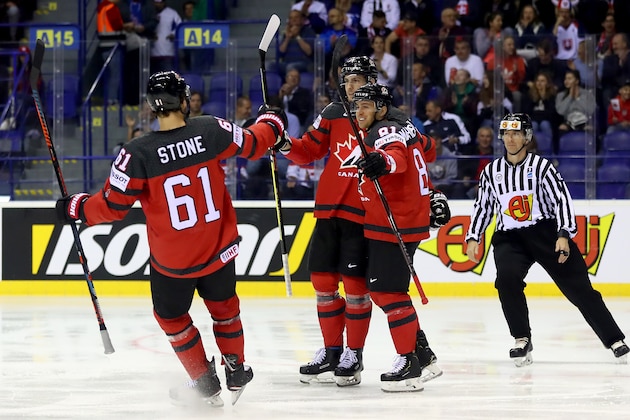 KOSICE, SLOVAKIA - MAY 21: Pierre Luc Dubois #18 of Canada celebrate with his team mates the opening goal during the 2019 IIHF Ice Hockey World Championship Slovakia group A game between Canada and United States at Steel Arena on May 21, 2019 in Kosice, Slovakia. (Photo by Martin Rose/Getty Images)