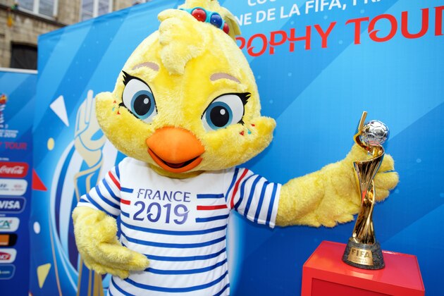VALENCIENNES, FRANCE - MAY 17:  Ettie the mascot FIFA Women's World Cup France 2019 poses with Trophy during the Valenciennes stopover of National Trophy Tour on May 17, 2019 in Valenciennes, France. (Photo by Sylvain Lefevre/Getty Images)