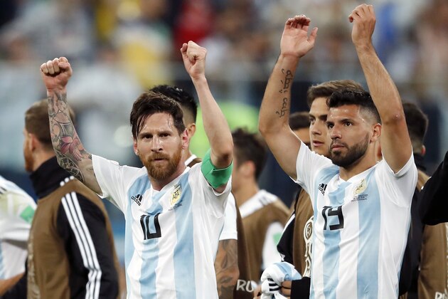 (L-R) Lionel Messi of Argentina, Sergio Aguero of Argentina during the 2018 FIFA World Cup Russia group  D match between Nigeria and Argentina at the Saint Petersburg Stadium on June 26, 2018 in Saint Petersburg, Russia(Photo by VI Images via Getty Images)