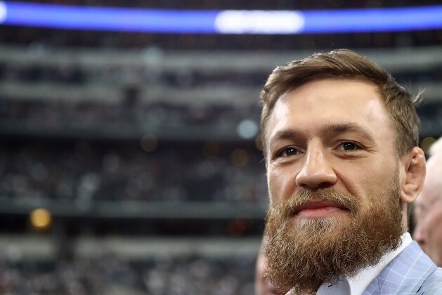 ARLINGTON, TX - OCTOBER 14:  Conor McGregor is seen on the sidelines before the NFL game between the Jacksonville Jaguars and Dallas Cowboys at AT&T Stadium on October 14, 2018 in Arlington, Texas.  (Photo by Ronald Martinez/Getty Images)