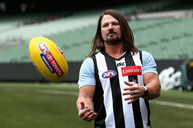 MELBOURNE, AUSTRALIA - JUNE 24: Smackdown women's champion Carmella and WWE'S world champion AJ Styles show their football skills at the Melbourne Cricket Ground on June 24, 2018 in Melbourne, Australia. (Photo by Robert Prezioso/Getty Images)