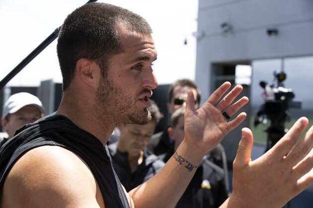 Oakland Raiders quarterback Derek Carr speaks to the media at a press conference following an official team activity, Tuesday, May 21, 2019 at the NFL football team's headquarters in Alameda, Calif. (AP Photo/D. Ross Cameron)