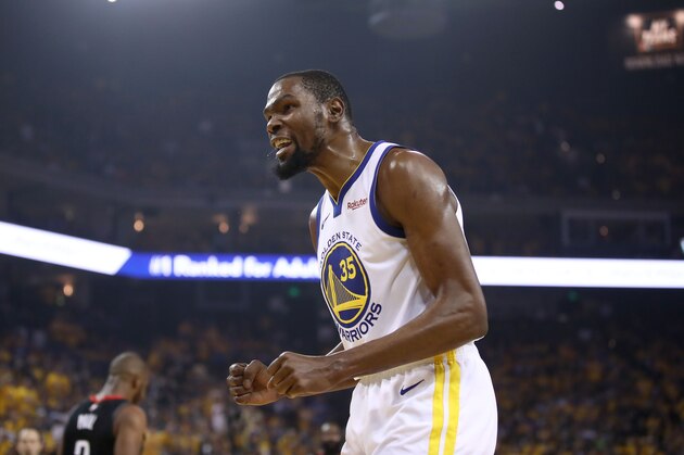 OAKLAND, CALIFORNIA - MAY 08:   Kevin Durant #35 of the Golden State Warriors reacts during their game against the Houston Rockets in Game Five of the Western Conference Semifinals of the 2019 NBA Playoffs at ORACLE Arena on May 08, 2019 in Oakland, California.  NOTE TO USER: User expressly acknowledges and agrees that, by downloading and or using this photograph, User is consenting to the terms and conditions of the Getty Images License Agreement.  (Photo by Ezra Shaw/Getty Images)