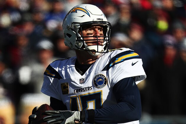 FOXBOROUGH, MASSACHUSETTS - JANUARY 13:  Philip Rivers #17 of the Los Angeles Chargers in action against the New England Patriots during their AFC Divisional Round playoff game at Gillette Stadium on January 13, 2019 in Foxborough, Massachusetts. (Photo by Al Bello/Getty Images)