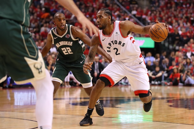 TORONTO, ONTARIO - MAY 21: Kawhi Leonard #2 of the Toronto Raptors handles the ball during the second half against the Milwaukee Bucks in game four of the NBA Eastern Conference Finals at Scotiabank Arena on May 21, 2019 in Toronto, Canada. NOTE TO USER: User expressly acknowledges and agrees that, by downloading and or using this photograph, User is consenting to the terms and conditions of the Getty Images License Agreement. (Photo by Gregory Shamus/Getty Images)