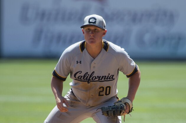 California first baseman Andrew Vaughn fields during an NCAA college baseball game between the University of California and the University of Utah, Friday, May 5, 2019, in Salt Lake City. (AP Photo/Tyler Tate)