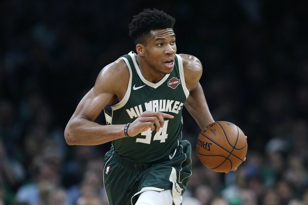 Milwaukee Bucks' Giannis Antetokounmpo brings the ball up court during the first half of Game 4 of a second round NBA basketball playoff series against the Boston Celtics in Boston, Monday, May 6, 2019. (AP Photo/Michael Dwyer)