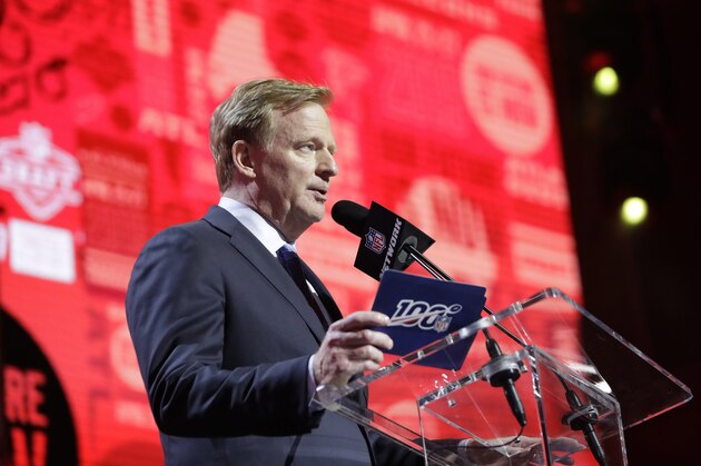 NFL Commissioner Roger Goodell announces Washington's Kaleb McGary has been selected by the Atlanta Falcons in the first round at the NFL football draft, Thursday, April 25, 2019, in Nashville, Tenn. (AP Photo/Mark Humphrey)