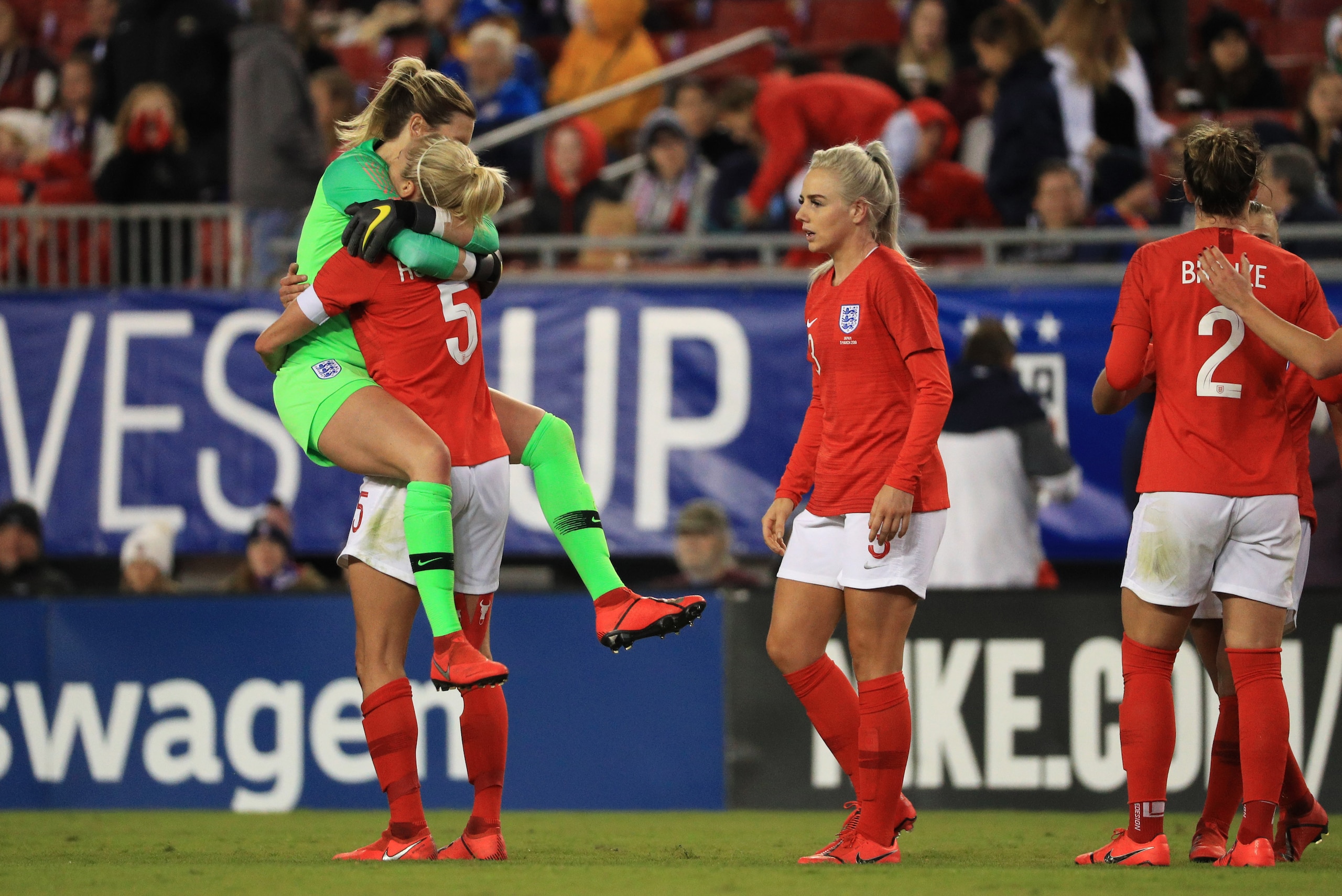 TAMPA, FLORIDA - MARCH 05:  Steph Houghton and Carly Telford of England celebrate victory after the 2019 SheBelieves Cup  match between England and Japan at Raymond James Stadium on March 05, 2019 in Tampa, Florida. (Photo by Mike Ehrmann/Getty Images)