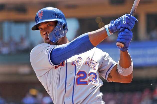 New York Mets' Keon Broxton warms up in the on-deck circle during the first inning of a baseball game against the St. Louis Cardinals Sunday, April 21, 2019, in St. Louis. (AP Photo/Jeff Roberson)