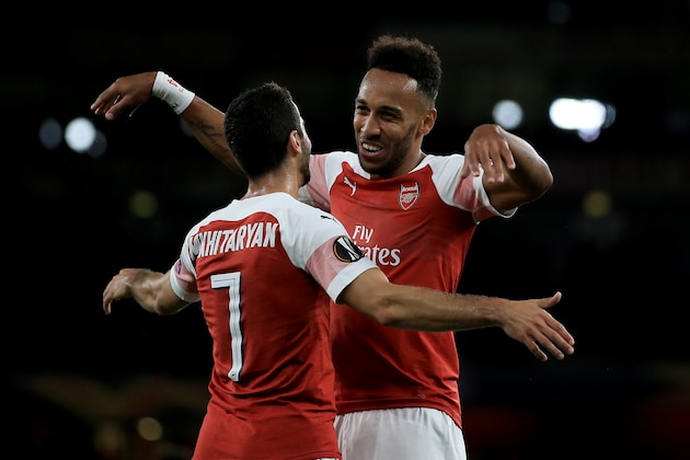 LONDON, ENGLAND - SEPTEMBER 20: Pierre-Emerick Aubameyang celebrates with Henrikh Mkhitaryan of Arsenal during the UEFA Europa League Group E match between Arsenal and Vorskla Poltava at Emirates Stadium on September 20, 2018 in London, United Kingdom. (Photo by Marc Atkins/Getty Images)