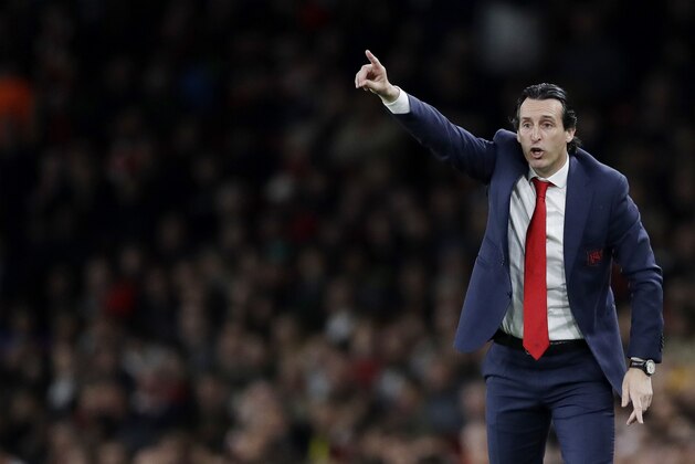 Arsenal manager Unai Emery gestures during the Europa League semifinal first leg soccer match between Arsenal and Valencia at the Emirates stadium in London, Thursday, May 2, 2019. (AP Photo/Kirsty Wigglesworth)