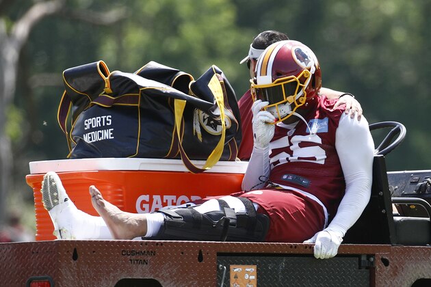 Washington Redskins linebacker Reuben Foster rides a cart off the field after suffering an injury during a practice at the team's NFL football practice facility, Monday, May 20, 2019, in Ashburn, Va. (AP Photo/Patrick Semansky)