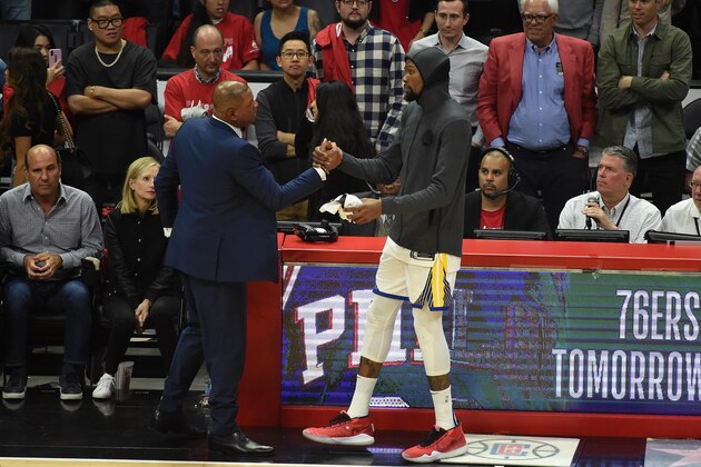 LOS ANGELES, CA - APRIL 26: Head Coach Doc Rivers of the LA Clippers exchange hi-fives with Kevin Durant #35 of the Golden State Warriors after Game Six of Round One of the 2019 NBA Playoffs on April 26, 2019 at STAPLES Center in Los Angeles, California. NOTE TO USER: User expressly acknowledges and agrees that, by downloading and/or using this Photograph, user is consenting to the terms and conditions of the Getty Images License Agreement. Mandatory Copyright Notice: Copyright 2019 NBAE (Photo by Adam Pantozzi/NBAE via Getty Images)