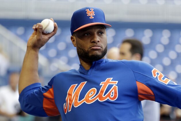 New York Mets' Robinson Cano warms up during batting practice before a baseball game against the Miami Marlins, Friday, May 17, 2019, in Miami. (AP Photo/Lynne Sladky)