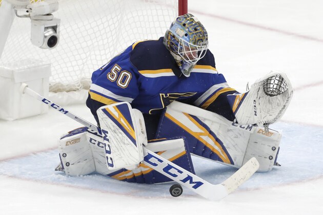 St. Louis Blues goaltender Jordan Binnington blocks a shot against the San Jose Sharks during the third period in Game 6 of the NHL hockey Stanley Cup Western Conference final series Tuesday, May 21, 2019, in St. Louis. (AP Photo/Tom Gannam)