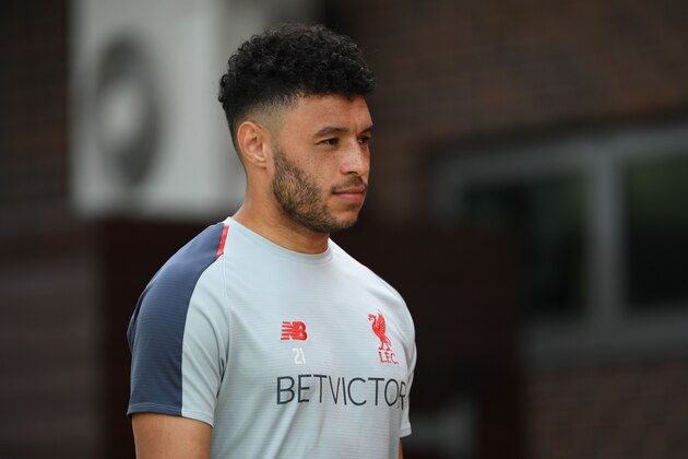 Liverpool's English midfielder Alex Oxlade-Chamberlain takes part in a team training session at Melwood in Liverpool, north west England on April 30, 2019, on the eve of their UEFA Champions League semi-final first leg football match against Barcelona. (Photo by Paul ELLIS / AFP)        (Photo credit should read PAUL ELLIS/AFP/Getty Images)