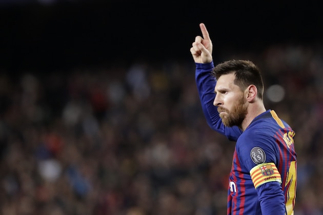 Barcelona's Lionel Messi celebrates after scoring his side's third goal during the Champions League semifinal, first leg, soccer match between FC Barcelona and Liverpool at the Camp Nou stadium in Barcelona, Spain, Wednesday, May 1, 2019. (AP Photo/Emilio Morenatti)