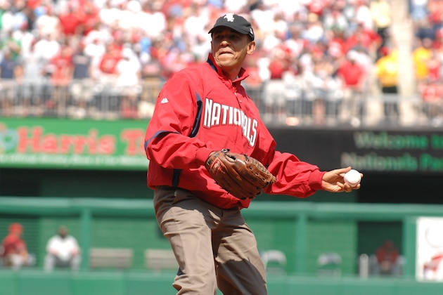 WASHINGTON - APRIL 5:  President Barack Obama of the United States throws out the first pitch before a baseball game between Washington Nationals and the Philadelphia Phillies on April 5, 2010 at Nationals Park in Washington, D.C.  (Photo by Mitchell Layton/Getty Images)