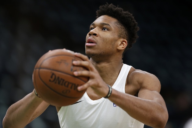 Milwaukee Bucks' Giannis Antetokounmpo warms up before Game 3 of a second round NBA basketball playoff series against the Boston Celtics in Boston, Friday, May 3, 2019. (AP Photo/Michael Dwyer)