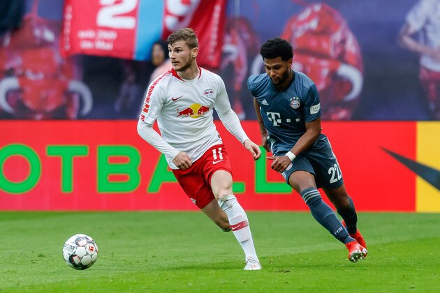 LEIPZIG, GERMANY - MAY 11: Timo Werner of RB Leipzig and Serge Gnabry of FC Bayern Muenchen battle for the ball during the Bundesliga match between RB Leipzig and Bayern Muenchen at Red Bull Arena on May 11, 2019 in Leipzig, Germany. (Photo by TF-Images/TF-Images via Getty Images)