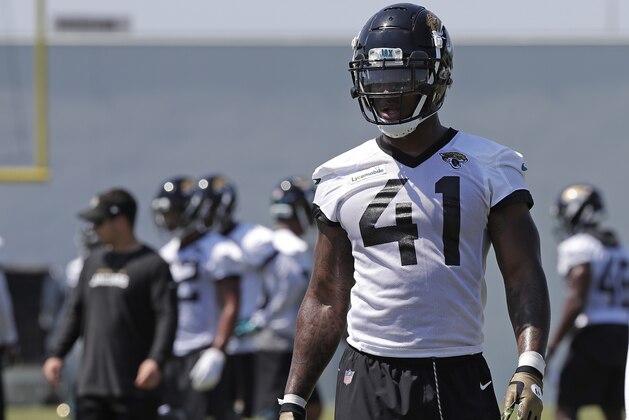 Jacksonville Jaguars defensive end Josh Allen prepares for drills during an NFL football practice, Tuesday, May 21, 2019, in Jacksonville, Fla. (AP Photo/John Raoux)