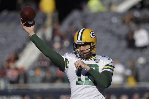 Green Bay Packers quarterback Aaron Rodgers (12) warms up before an NFL football game against the Chicago Bears Sunday, Dec. 16, 2018, in Chicago. (AP Photo/David Banks)