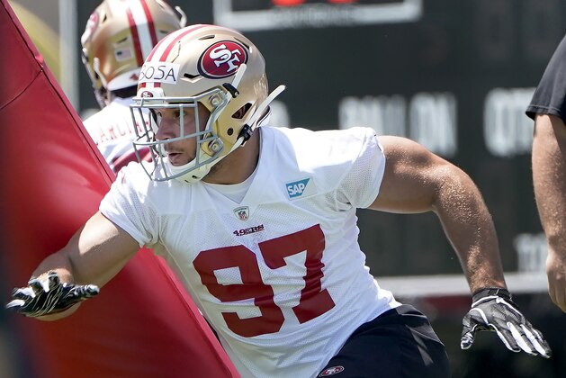 San Francisco 49ers first-round draft pick defensive lineman Nick Bosa (97) works on a drill during the NFL football team's rookie minicamp in Santa Clara, Calif., Friday, May 3, 2019. (AP Photo/Tony Avelar)
