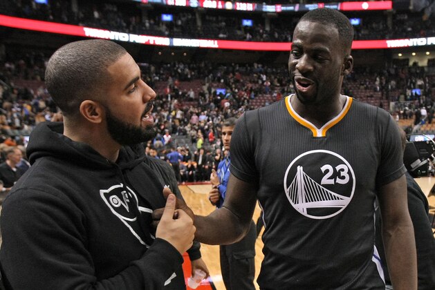 TORONTO, ON - DECEMBER 5:  Drake and Draymond Green #23 of the Golden State Warriors after the game against the Toronto Raptors on December 5, 2015 at Air Canada Centre in Toronto, Ontario, Canada. NOTE TO USER: User expressly acknowledges and agrees that, by downloading and or using this photograph, User is consenting to the terms and conditions of the Getty Images License Agreement. Mandatory Copyright Notice: Copyright 2015 NBAE (Photo by Dave Sandford/NBAE via Getty Images)