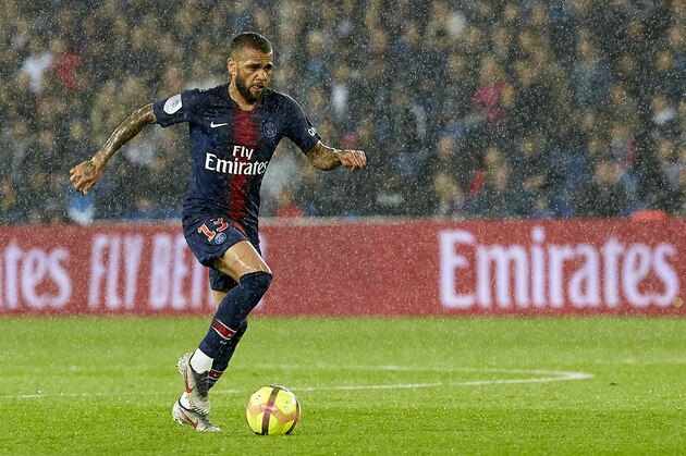 PARIS, FRANCE - MAY 18: Dani Alves of Paris Saint-Germain runs with the ball during the French Ligue 1 match between Paris Saint-Germain and Dijon FCO at Parc des Princes on May 18, 2019 in Paris, France. (Photo by Quality Sport Images/Getty Images)