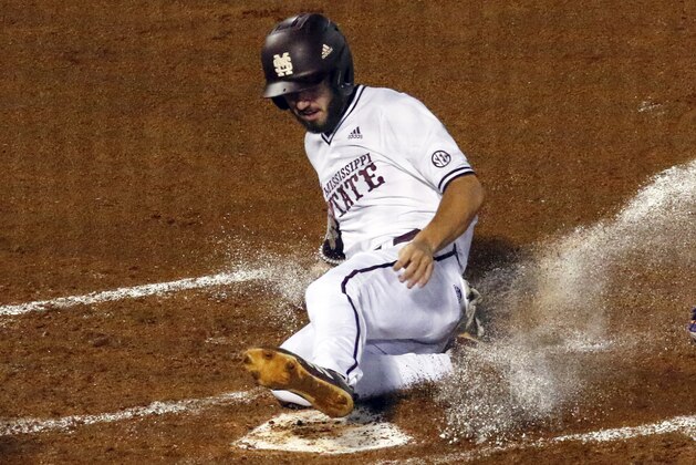 Mississippi State's Josh Hatcher scores during the second inning against LSU in an Southeastern Conference tournament NCAA college baseball game Wednesday, May 22, 2019, in Hoover, Ala. (AP Photo/Butch Dill)