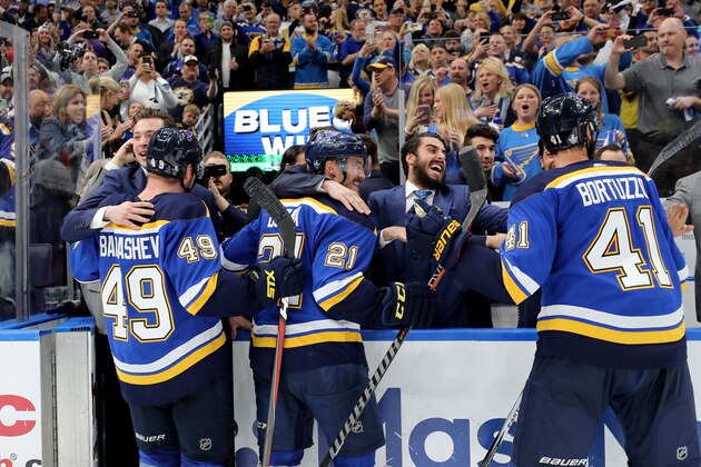 ST LOUIS, MISSOURI - MAY 21: Ivan Barbashev #49, Tyler Bozak #21 and Robert Bortuzzo #41 of the St. Louis Blues celebrate after defeating the San Jose Sharks in Game Six with a score of 5 to 1 to win the Western Conference Finals during the 2019 NHL Stanley Cup Playoffs at Enterprise Center on May 21, 2019 in St Louis, Missouri. (Photo by Elsa/Getty Images)