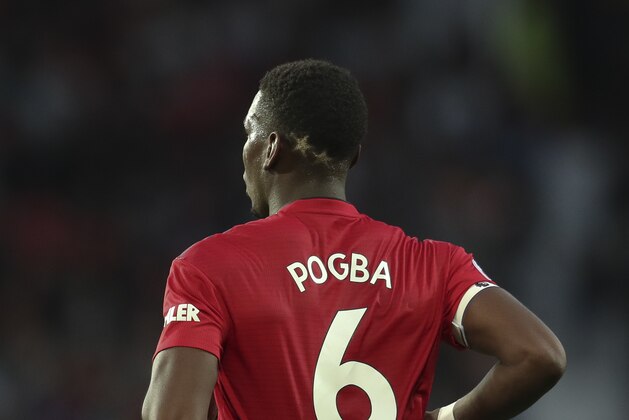 Manchester United's Paul Pogba who has two gold stars colouring the back of his head, a reference to the 2 World Cups that France have won, the during the English Premier League soccer match between Manchester United and Leicester City at Old Trafford, in Manchester, England, Friday, Aug. 10, 2018. (AP Photo/Jon Super)