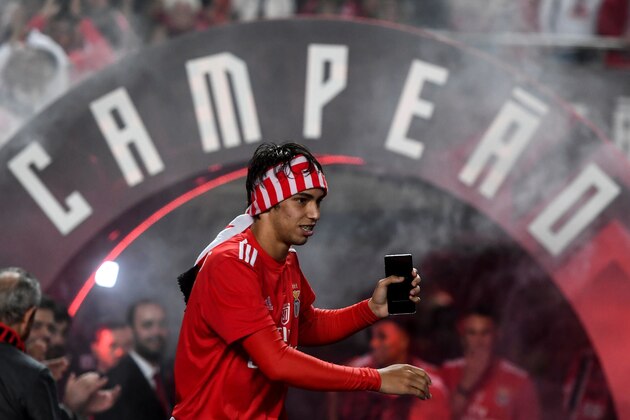 Benfica's midfielder Joao Felix  arrives to celebrate as Benfica won the Portuguese League Championship at the end of the Portuguese League football match between Benfica and Santa Clara at the Luz stadium in Porto on May 18, 2019. (Photo by PATRICIA DE MELO MOREIRA / AFP)        (Photo credit should read PATRICIA DE MELO MOREIRA/AFP/Getty Images)
