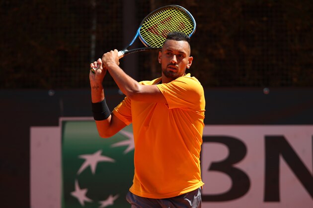 ROME, ITALY - MAY 16:  Nick Kyrgios of Australia plays a backhand against Casper Rudd of Norway in their Mens Singles Round of 32 Match during Day Five of the International BNL d'Italia at Foro Italico on May 16, 2019 in Rome, Italy. (Photo by Clive Brunskill/Getty Images)