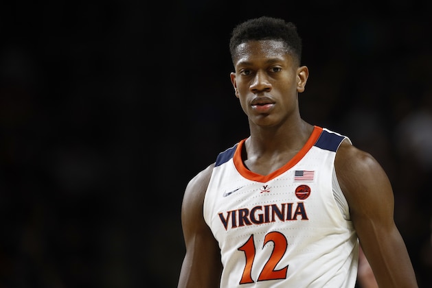 Virginia guard De'Andre Hunter walks on the court in the second half of an NCAA college basketball game against Maryland, Wednesday, Nov. 28, 2018, in College Park, Md. (AP Photo/Patrick Semansky)