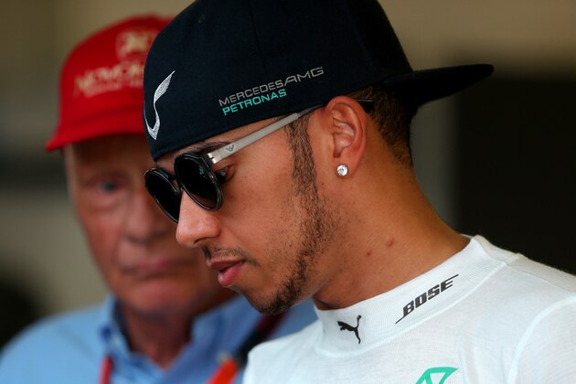 MONTMELO, SPAIN - MAY 09:  Lewis Hamilton of Great Britain and Mercedes GP speaks with Mercedes GP non-executive director Niki Lauda in the garage during qualifying for the Spanish Formula One Grand Prix at Circuit de Catalunya on May 9, 2015 in Montmelo, Spain.  (Photo by Mark Thompson/Getty Images)