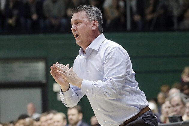 FILE - In this  Jan. 12, 2019, file photo, San Francisco head coach Kyle Smith reacts during the first half of an NCAA college basketball game against Gonzaga in San Francisco. Washington State has hired Kyle Smith as its new men's basketball coach following the disappointing tenure of Ernie Kent, a person with knowledge of the hiring said Wednesday, March 27, 2019. (AP Photo/Jeff Chiu, File)