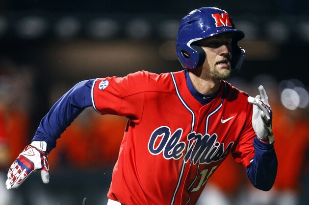 Ole Miss' Grae Kissinger runs to first during an NCAA college baseball game against Auburn, Friday, April 19, 2019, in Auburn, Ala. (AP Photo/Butch Dill)