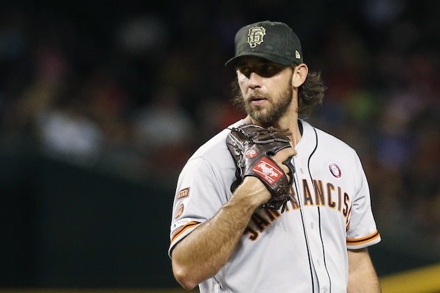 San Francisco Giants' Madison Bumgarner pitches against the Arizona Diamondbacks during the fourth inning of a baseball game, Saturday, May 18, 2019, in Phoenix. (AP Photo/Ralph Freso)