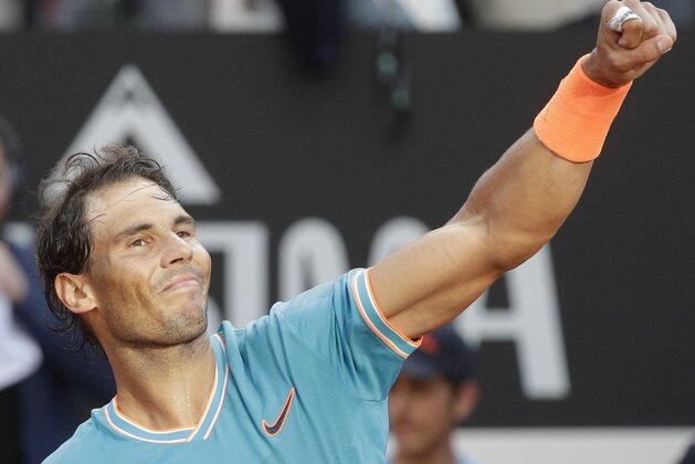 Rafael Nadal of Spain celebrates winning against Novak Djokovic of Serbia at the end of their final match at the Italian Open tennis tournament, in Rome, Sunday, May 19, 2019. (AP Photo/Gregorio Borgia) Rafael Nadal of Spain celebrates winning against Novak Djokovic of Serbia at the end of their final match at the Italian Open tennis tournament, in Rome, Sunday, May 19, 2019. (AP Photo/Gregorio Borgia)
