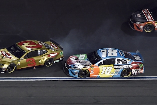 Austin Dillon (3) spins after contact from Kyle Busch (18) during the NASCAR All-Star Race at Charlotte Motor Speedway in Concord, N.C., Saturday, May 18, 2019. (AP Photo/Mike McCarn)