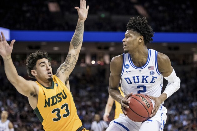 Duke forward Cam Reddish (2) makes a move against North Dakota State guard Jordan Horn (33) during the first half of a first-round game in the NCAA men’s college basketball tournament Friday, March 22, 2019, in Columbia, S.C. (AP Photo/Sean Rayford)