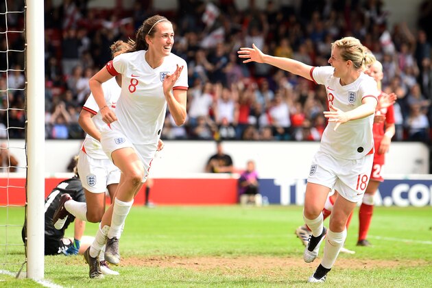 WALSALL, ENGLAND - MAY 25:   Jill Scott of England celebrates with teammate Ellen White after scoring her team's second goal during the International Friendly between England Women and Denmark Women at Bank's Stadium on May 25, 2019 in Walsall, England. (Photo by Nathan Stirk/Getty Images)